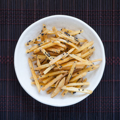 Brown Sugar - Glazed sweet potato fries with black sesame