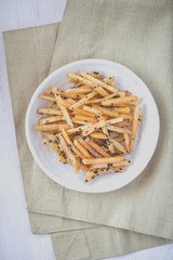 Brown Sugar - Glazed sweet potato fries with black sesame