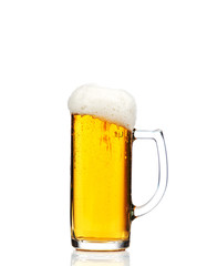 Glass of beer on white background