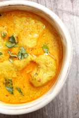 Stewpot of Indian curry and spices.