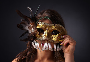 Beautiful woman with carnival mask
