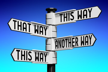 Fototapeta premium Signpost with four arrows - this way