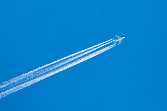 Plane in blue sky © michaklootwijk