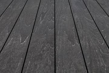 Outdoor black wooden floor pattern and background