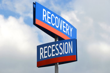 Recovery and recession street sign