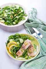 Steamed catfish filet with arugula salad