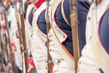 Detail view of french soldier uniform from 1800s. Reenactment of the Battle of the Three Emperors (Battle of Austerlitz) in 1805. - obrazy, fototapety, plakaty