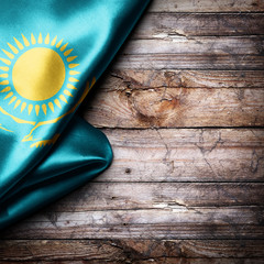 Flag of Kazakhstan on wooden boards