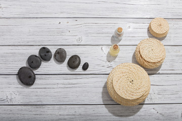 stones for oriental spa massage therapy on wooden background