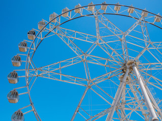 Ferris wheel with blue sky