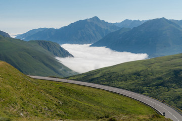 Scenic road leading through Pyrenees Mountains, France.
