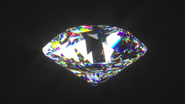 Physically correct round cut diamond spinning as a seamless loop on a black background