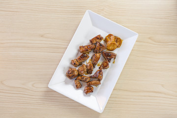 Pork stir fry with vegetables in korea style in white plate