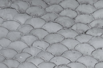 Concrete wall in fish scale shape pattern texture background. © bigy9950