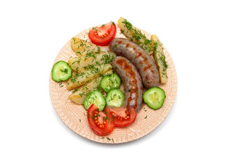 appetizing grilled sausages with vegetables on a plate