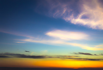 Colorful sunrise, sunset clouds and sun rays. Nature, background, landscape