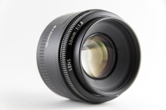 The lens is fixed focus on a white background