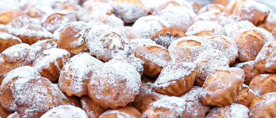 Many small sweet honey muffins. selective focus