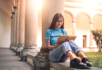 Student reading a book