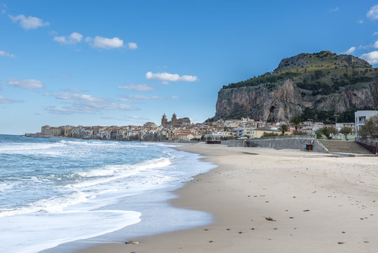 View of Cefalu beach at the foot of the mountain. Sicily. Italy