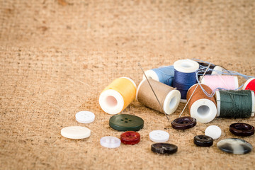 Vintage background with sewing tools and sewing kit