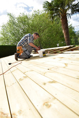 Carpenter building wooden deck