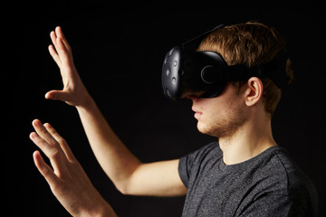 Young Man Wearing Virtual Reality Headset