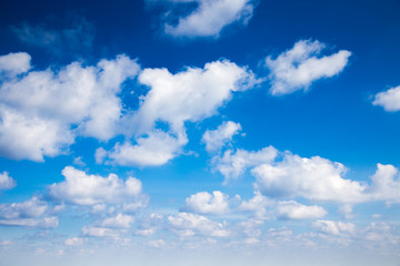 Fototapeta na wymiar White clouds in blue sky wide angle view