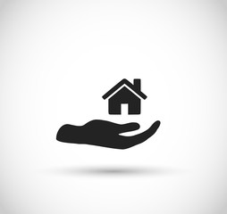 Hand holding house icon vector