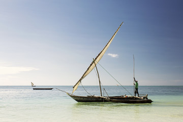 Obraz premium Traditional Fisherman Dhow Boat during the day, Zanzibar, Tanzan