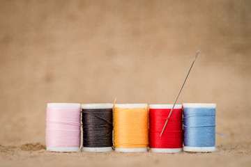 Vintage background with sewing tools and sewing kit