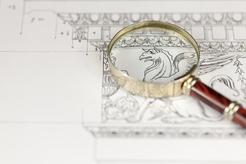 magnifying glass & architectural drawing