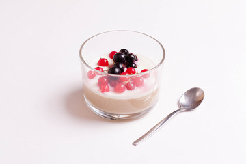 Chocolate dessert panna cotta with currant