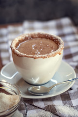 Cup of coffee with chocolate and coconut 