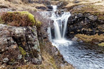 Small waterfall in Scottish mountains