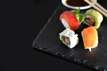 dish with various types of sushi
