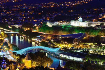Night Tbilisi. Peace Bridge. Presidential palace. The capital of