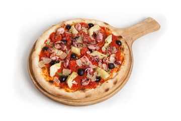 Whole pizza on white background
