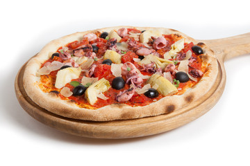 Whole pizza on white background