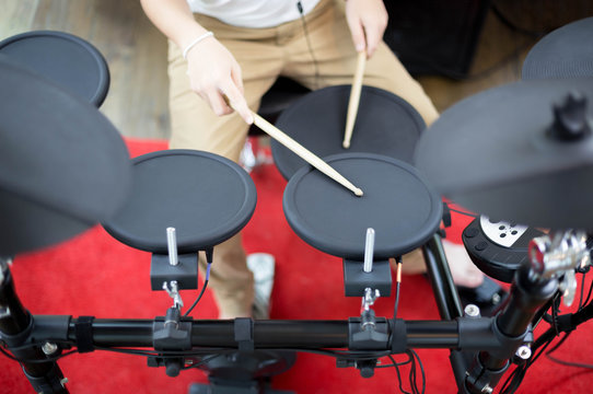 Asian Boy Learning Play Electronic Drum