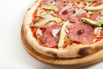 Avocado pizza on wooden board