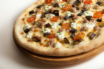 Whole pizza on white background