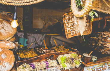 fair. food. food trade concept. old wooden hut in a vintage style background. bread on the ancient pillars. trade fair