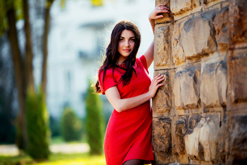 portrait of a beautiful girl on the street. photo with warm colors