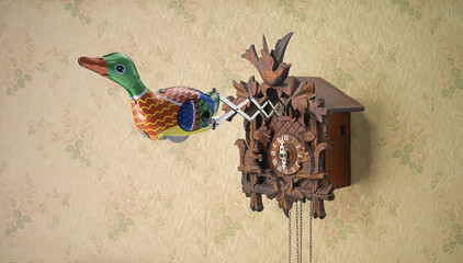Tin toy duck coming out of Cuckoo Clock