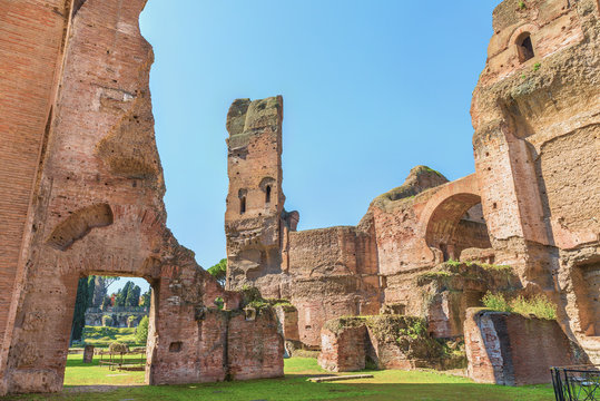 Panoramic view on the central part of the ancient Roman Baths of Caracalla ( Thermae Antoninianae ) at summer sunny day.Famous architectural landmark built between AD 212 and 217. Rome. Italy. Europe.
