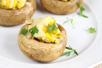 Grilled mushroom filled with eggs & cheese