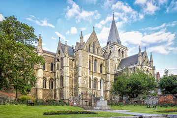Fototapeta na wymiar Rochester, United Kingdom - June 9, 2015: Side view of Rochester Cathedral