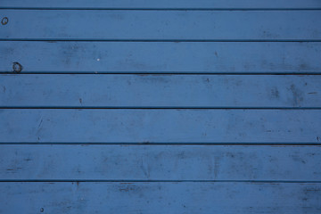 Obraz na płótnie Canvas Blue wood panels used as background for designer