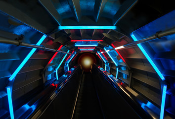 Futuristic tunnel background with blue and red glowing lights. perspective view abstract interior.